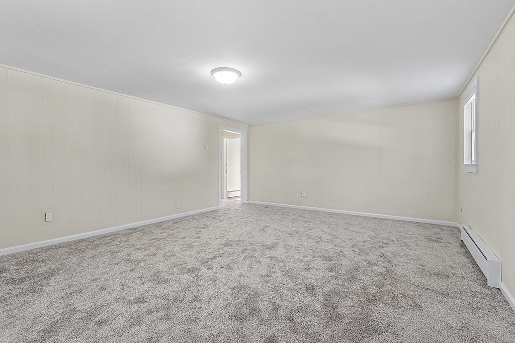 8 Main Street, Unit 2R Pepperell, MA 01463 - Photo 9 of 13 a view of empty room