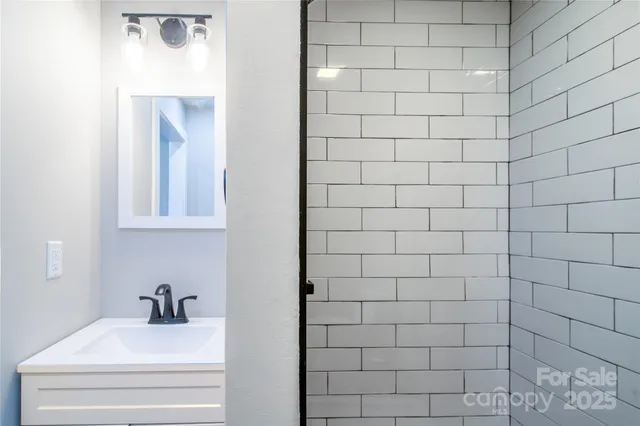 a white bath tub sitting in a bathroom