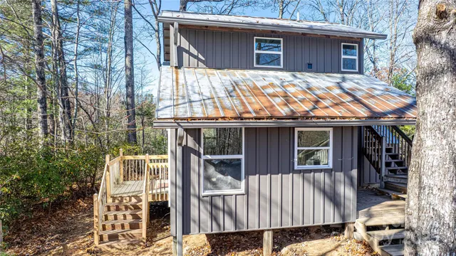 a view of a house with brick walls