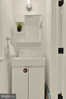 a bathroom with a sink and a vanity