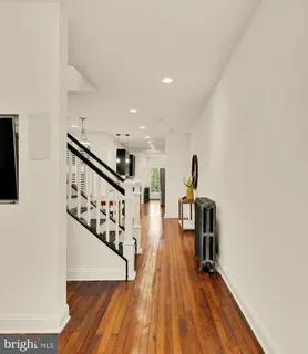 a view of entryway with wooden floor