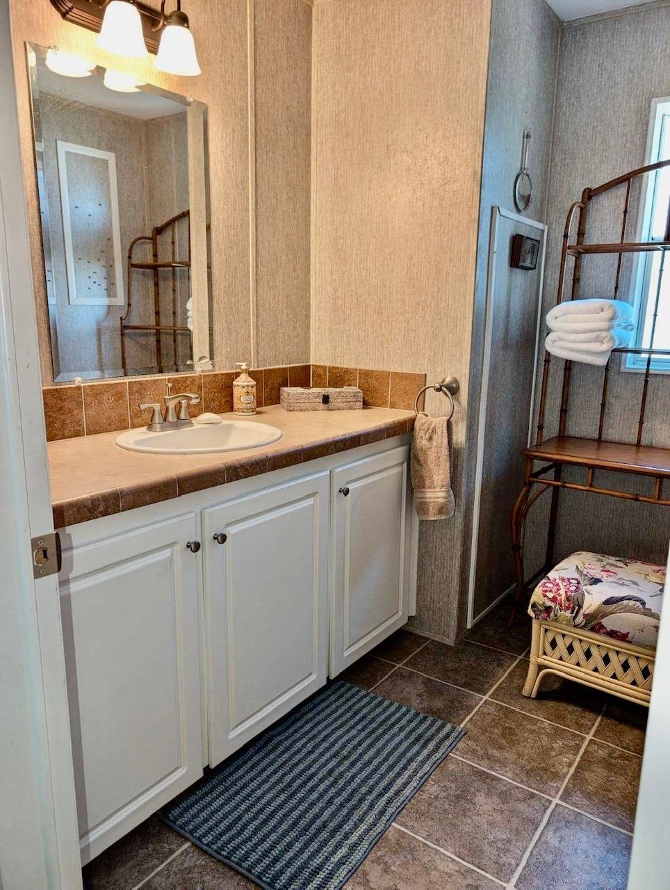 292 Majorca Road St. Augustine, FL 32080 - Photo 12 of 21 a bathroom with a sink and a mirror