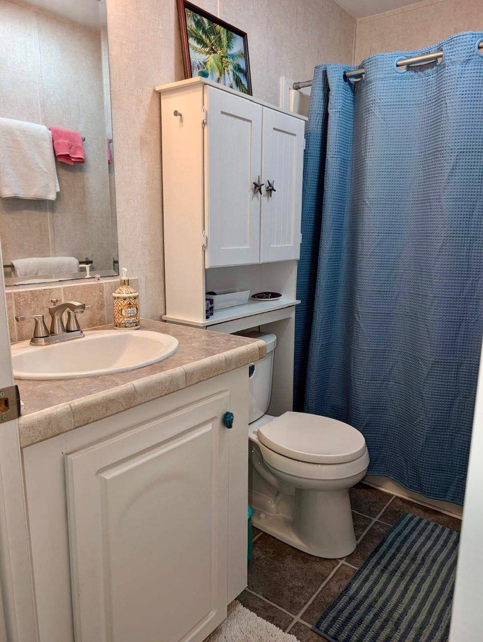 292 Majorca Road St. Augustine, FL 32080 - Photo 13 of 21 a bathroom with a sink toilet and a mirror