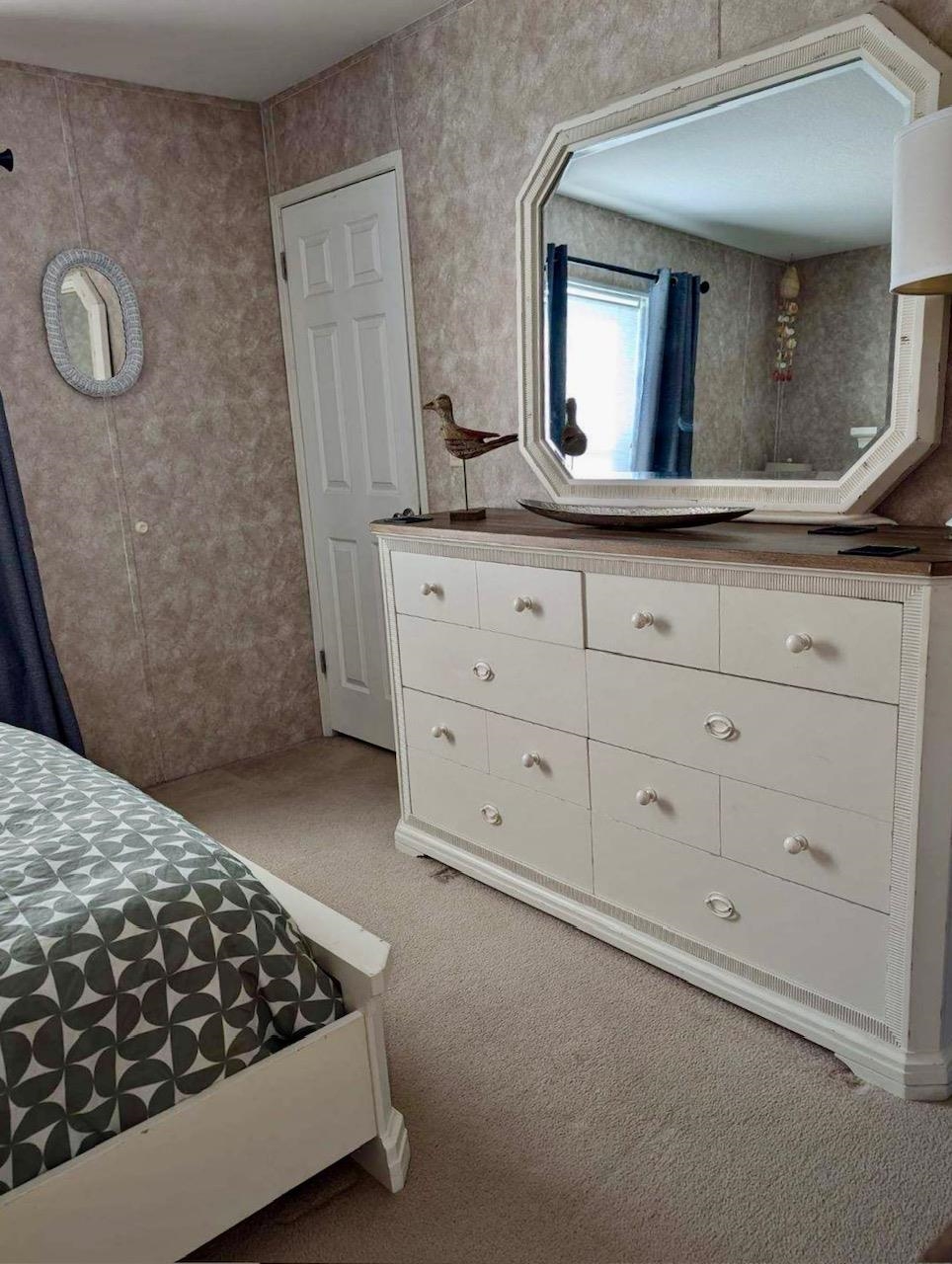 292 Majorca Road St. Augustine, FL 32080 - Photo 15 of 21 a bathroom with a sink and a mirror