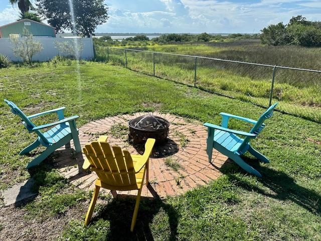 292 Majorca Road St. Augustine, FL 32080 - Photo 2 of 21 a view of a chairs and table on the lake