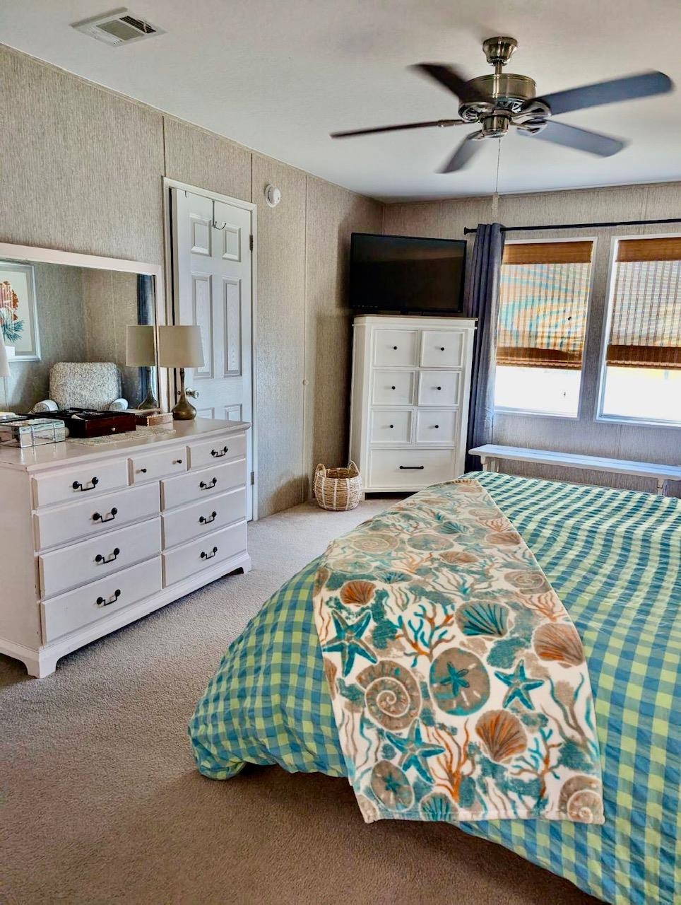 292 Majorca Road St. Augustine, FL 32080 - Photo 9 of 21 a bedroom with a bed and a tv in it