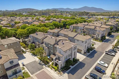 an aerial view of a city with lots of residential buildings
