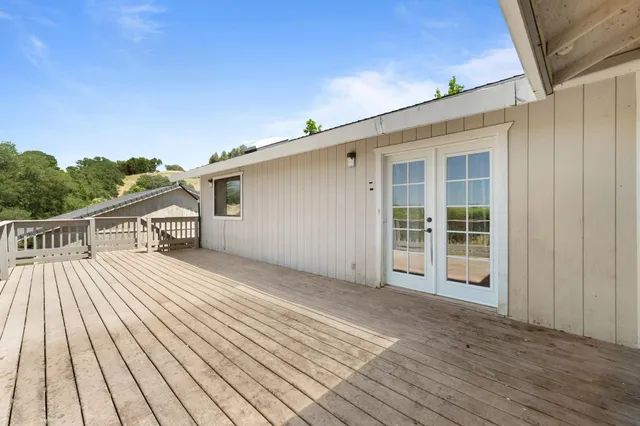 a view of a house with a roof deck