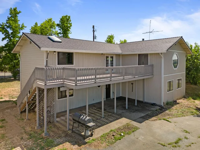 a house view with a outdoor space