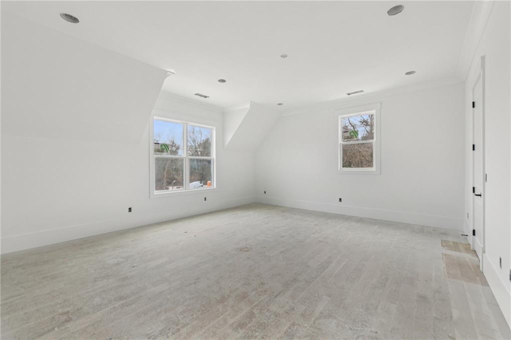 3207 Thompson Mill Road Buford, GA 30519 - Photo 23 of 35 an empty room with windows