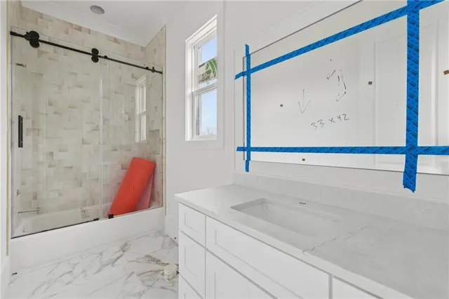 a bathroom with a shower and a bathtub