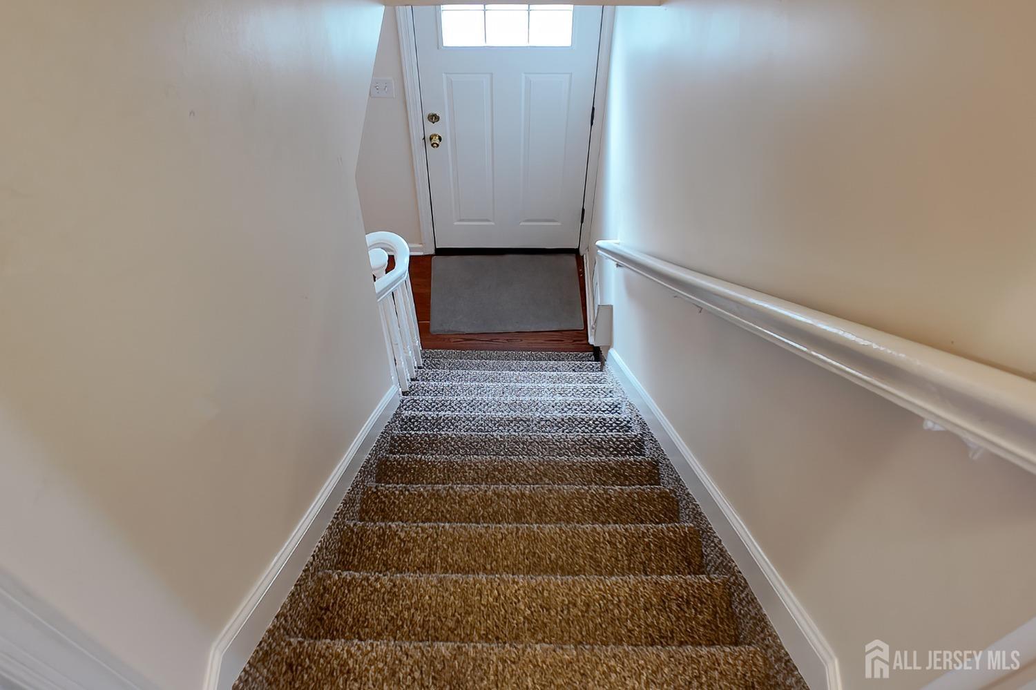 202 Jackson Avenue Edison, NJ 08837 - Photo 20 of 35 a view of staircase with white walls