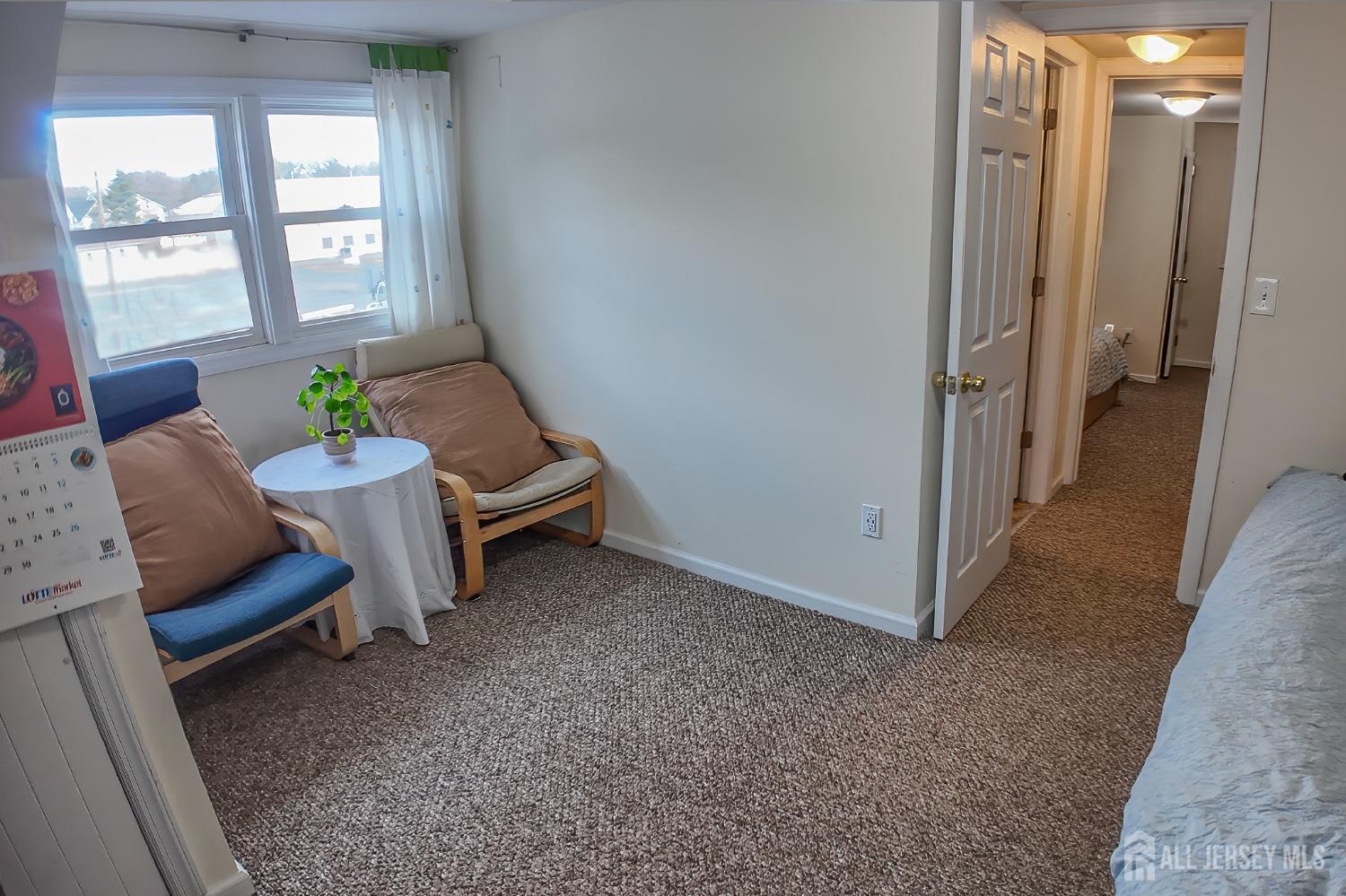 202 Jackson Avenue Edison, NJ 08837 - Photo 25 of 35 a living room with furniture and a window