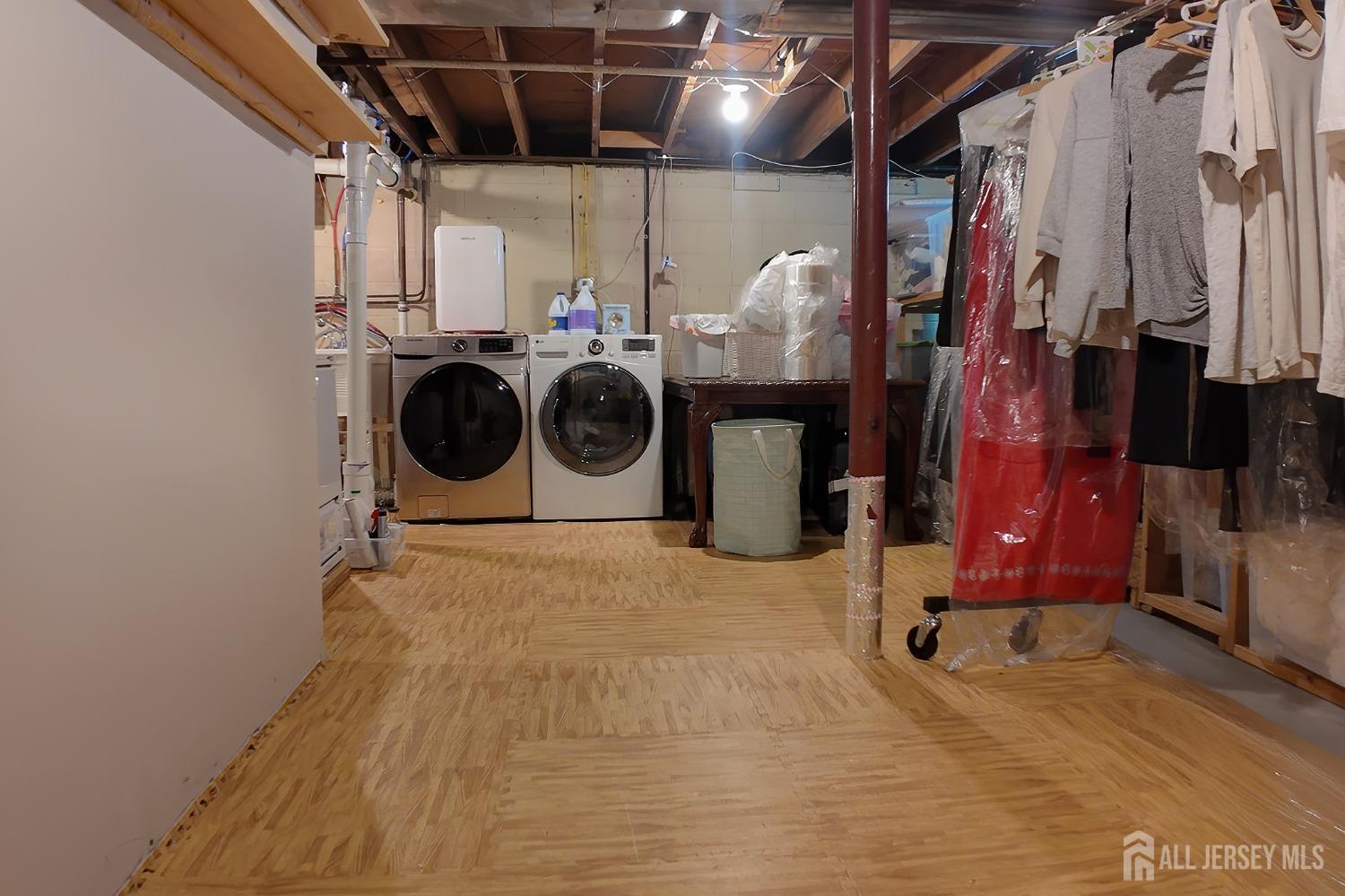 202 Jackson Avenue Edison, NJ 08837 - Photo 28 of 35 a utility room with dryer and washer
