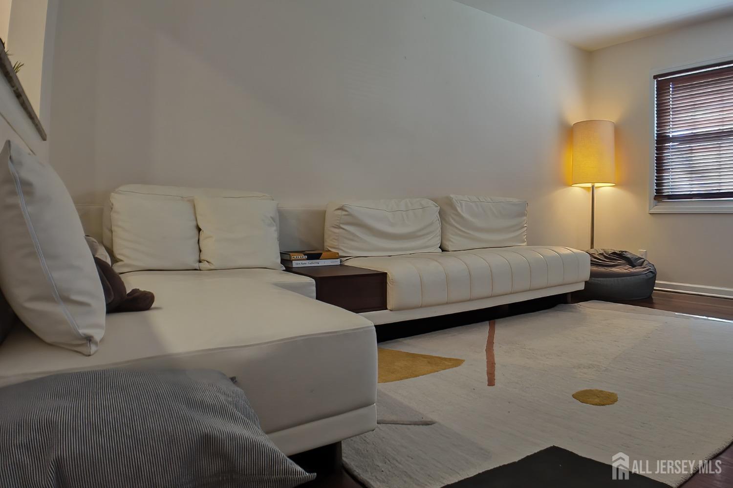 202 Jackson Avenue Edison, NJ 08837 - Photo 8 of 35 a bedroom with bed and window