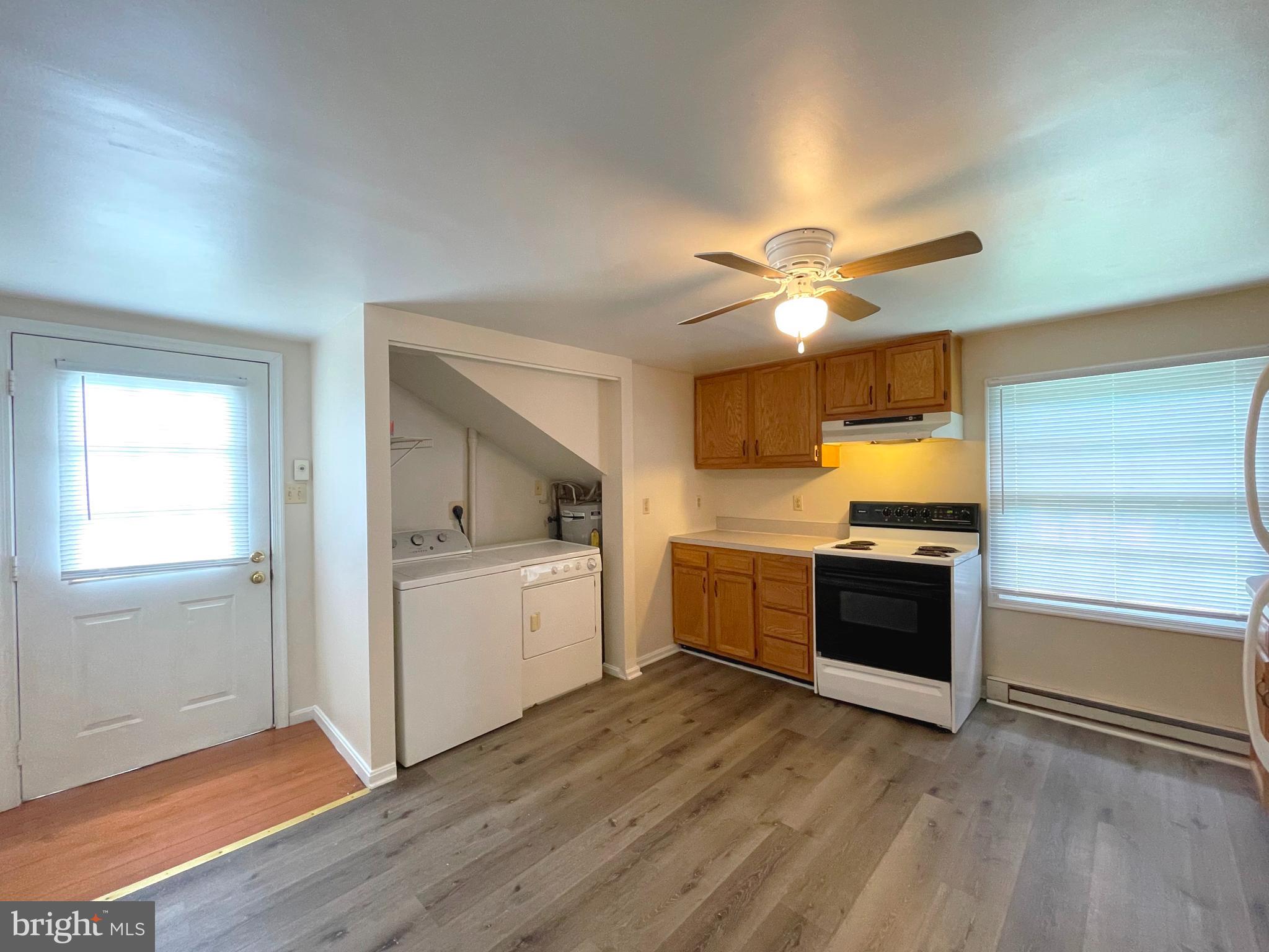 490 Coster Road, Unit 2 Lusby, MD 20657 - Photo 2 of 14 Kitchen/Dining/Laundry