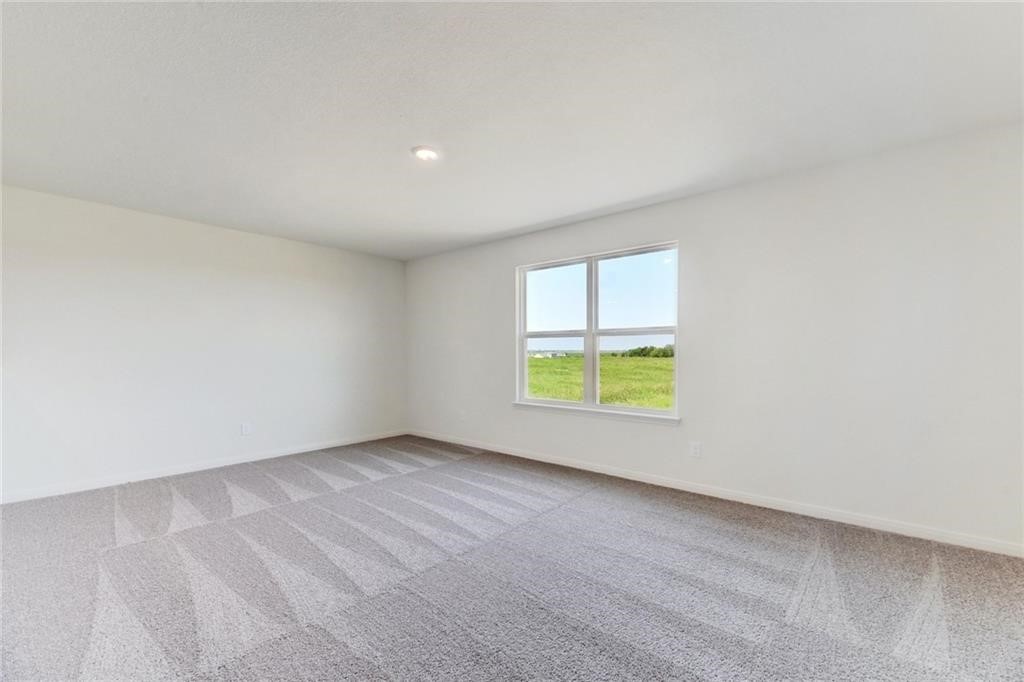 112 Dupont Pass Jarrell, TX 76537 - Photo 10 of 17 an empty room with a window