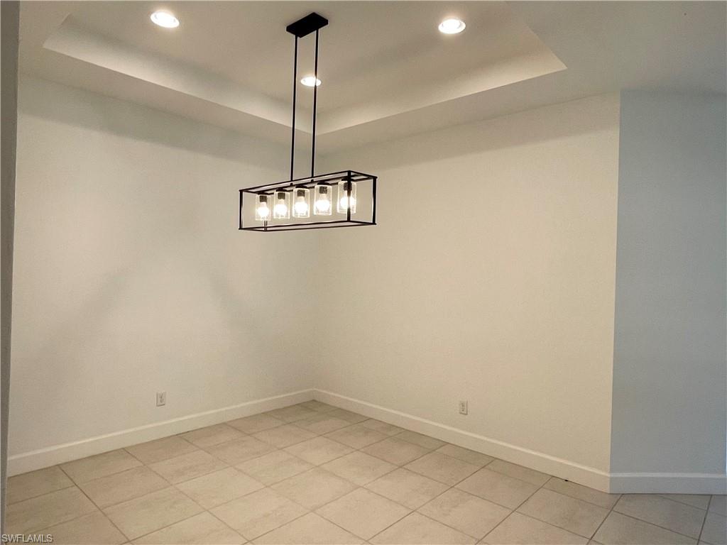8217 Lucello Terrace West Naples, FL 34114 - Photo 12 of 41 a view of a room with a chandelier fan
