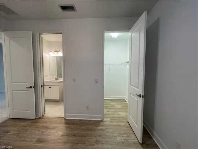 a bathroom with a sink tub toilet and shower