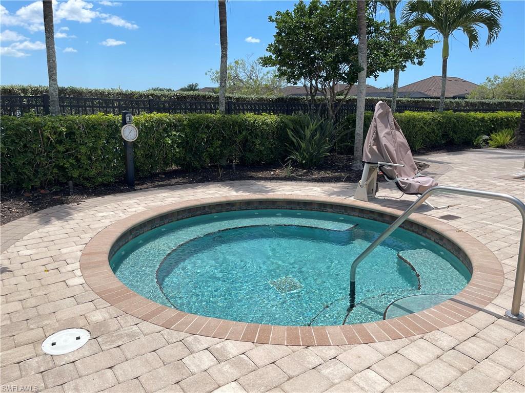 8217 Lucello Terrace West Naples, FL 34114 - Photo 32 of 41 a view of a swimming pool with a patio and plants