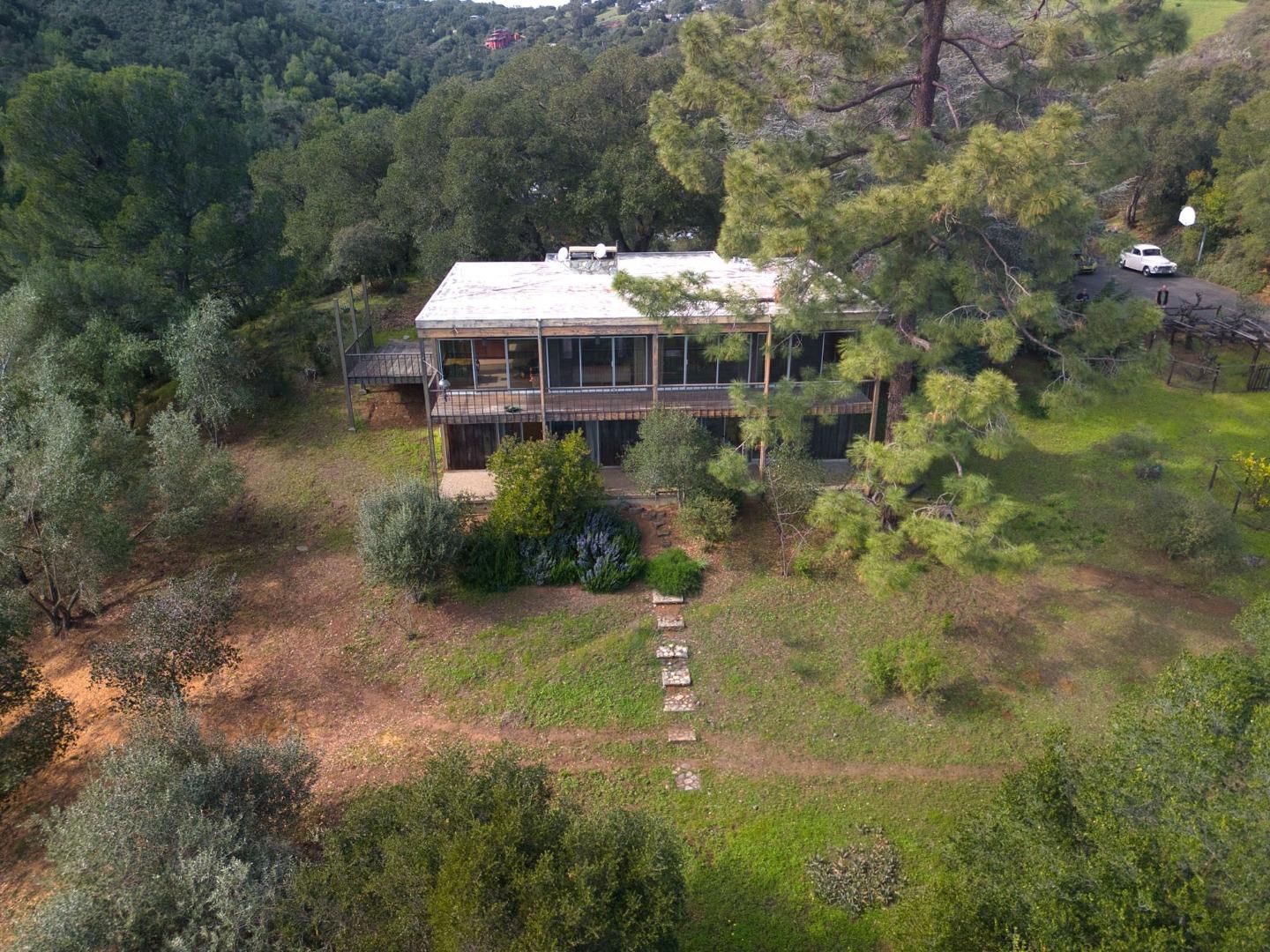 26969 Moody Road Los Altos Hills, CA 94022 - Photo 12 of 52 a view of a house with a yard