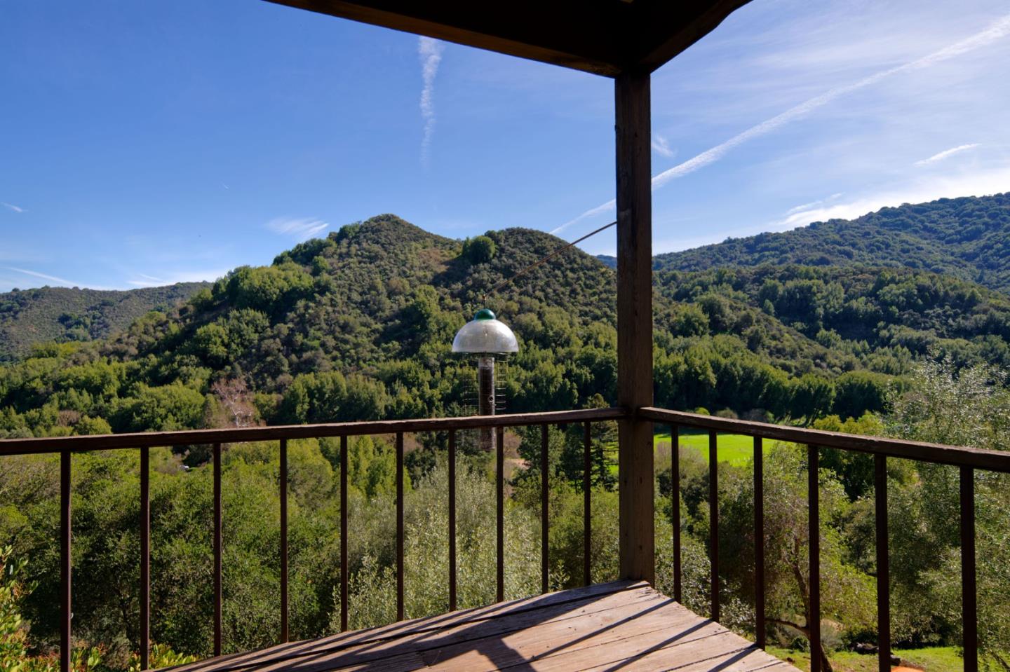 26969 Moody Road Los Altos Hills, CA 94022 - Photo 14 of 52 a view of a balcony with wooden floor next to a yard