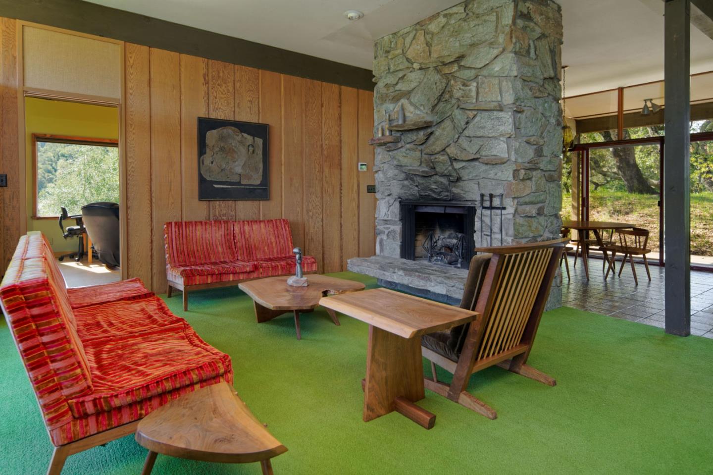 26969 Moody Road Los Altos Hills, CA 94022 - Photo 25 of 52 a living room with furniture and a fireplace