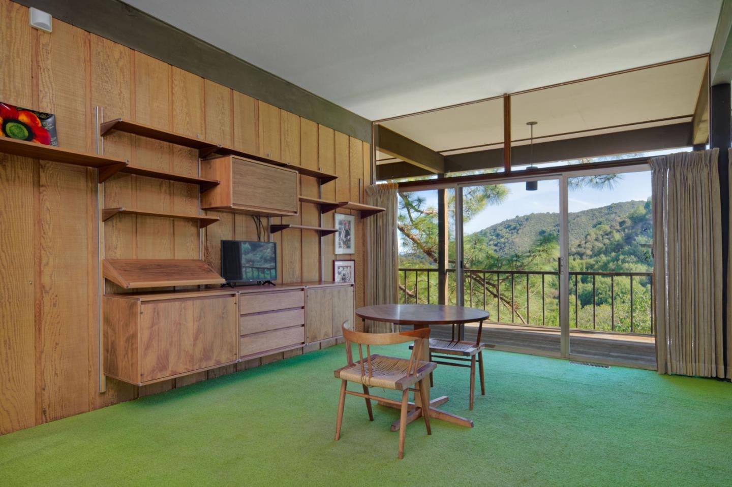 26969 Moody Road Los Altos Hills, CA 94022 - Photo 26 of 52 a kitchen with a table chairs and entryway