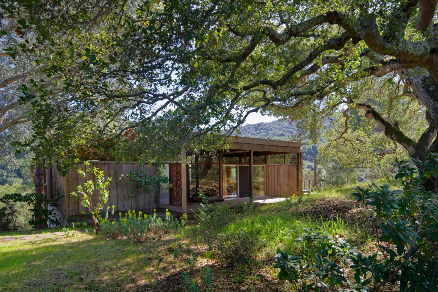 26969 Moody Road Los Altos Hills, CA 94022 - Photo 3 of 52 a view of a house with a tree