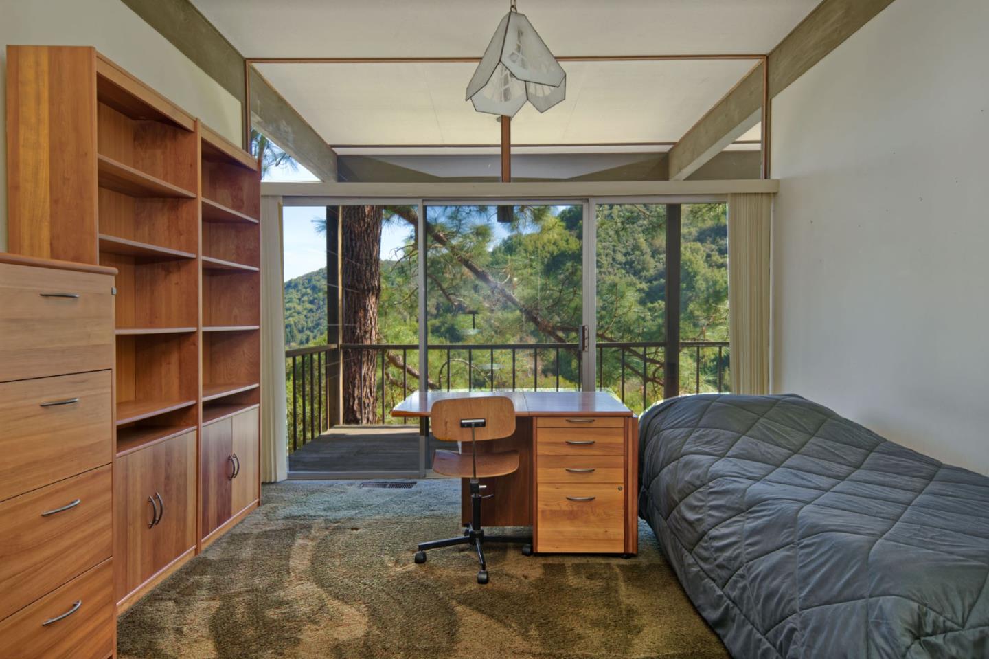 26969 Moody Road Los Altos Hills, CA 94022 - Photo 35 of 52 a living room with furniture and a floor to ceiling window