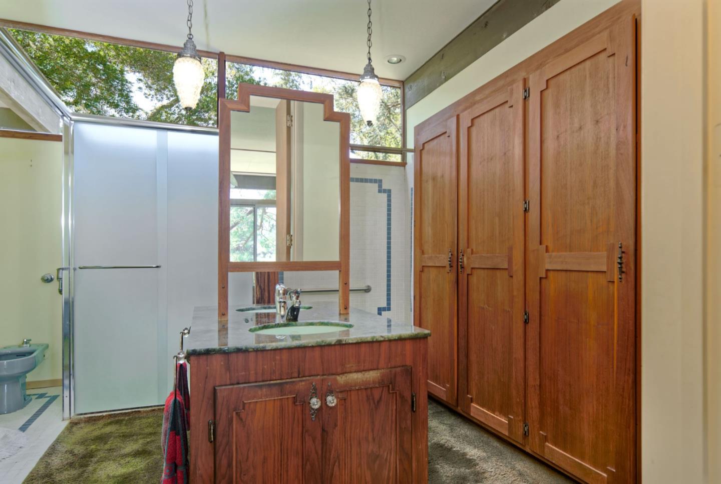 26969 Moody Road Los Altos Hills, CA 94022 - Photo 36 of 52 a bathroom with a sink a toilet and shower