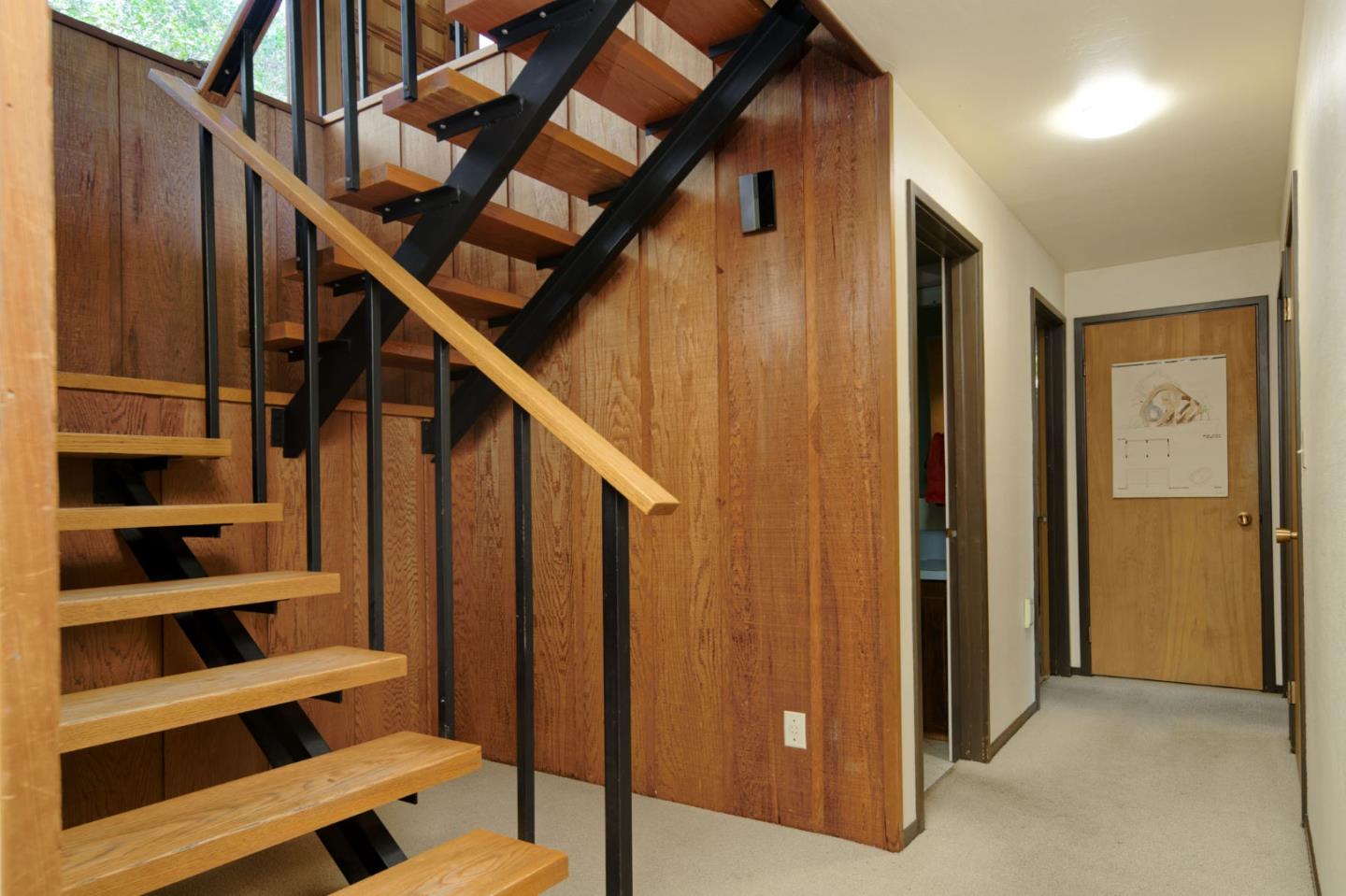 26969 Moody Road Los Altos Hills, CA 94022 - Photo 40 of 52 a view of an entryway with wooden floor and cabinets
