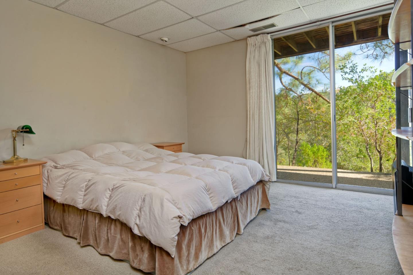 26969 Moody Road Los Altos Hills, CA 94022 - Photo 41 of 52 a bedroom with a bed and a window