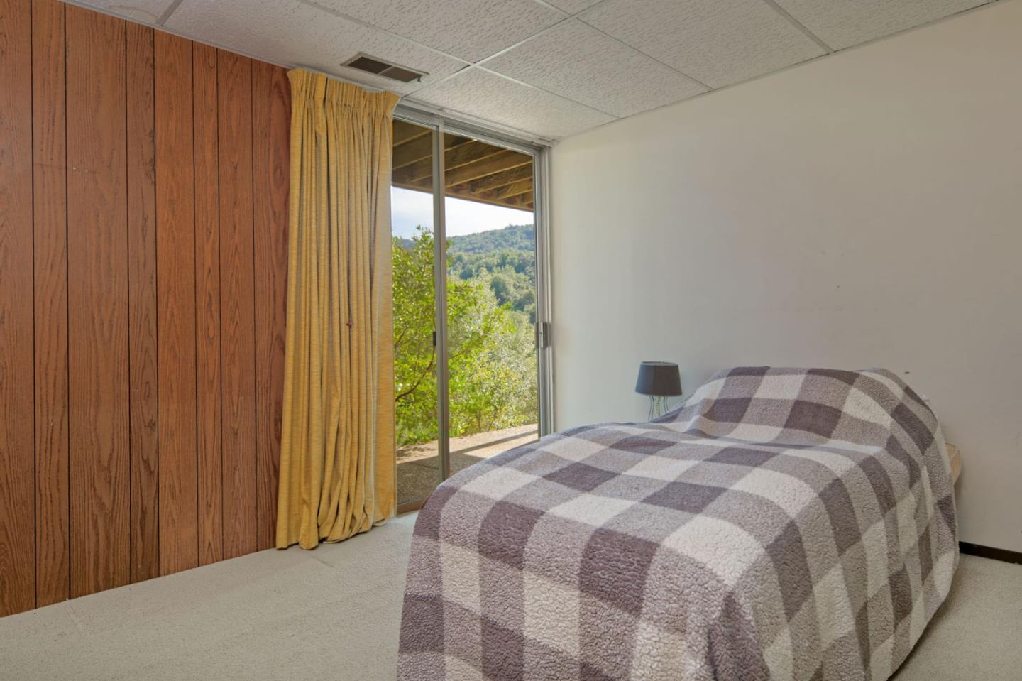 26969 Moody Road Los Altos Hills, CA 94022 - Photo 42 of 52 a bedroom with a bed and a window