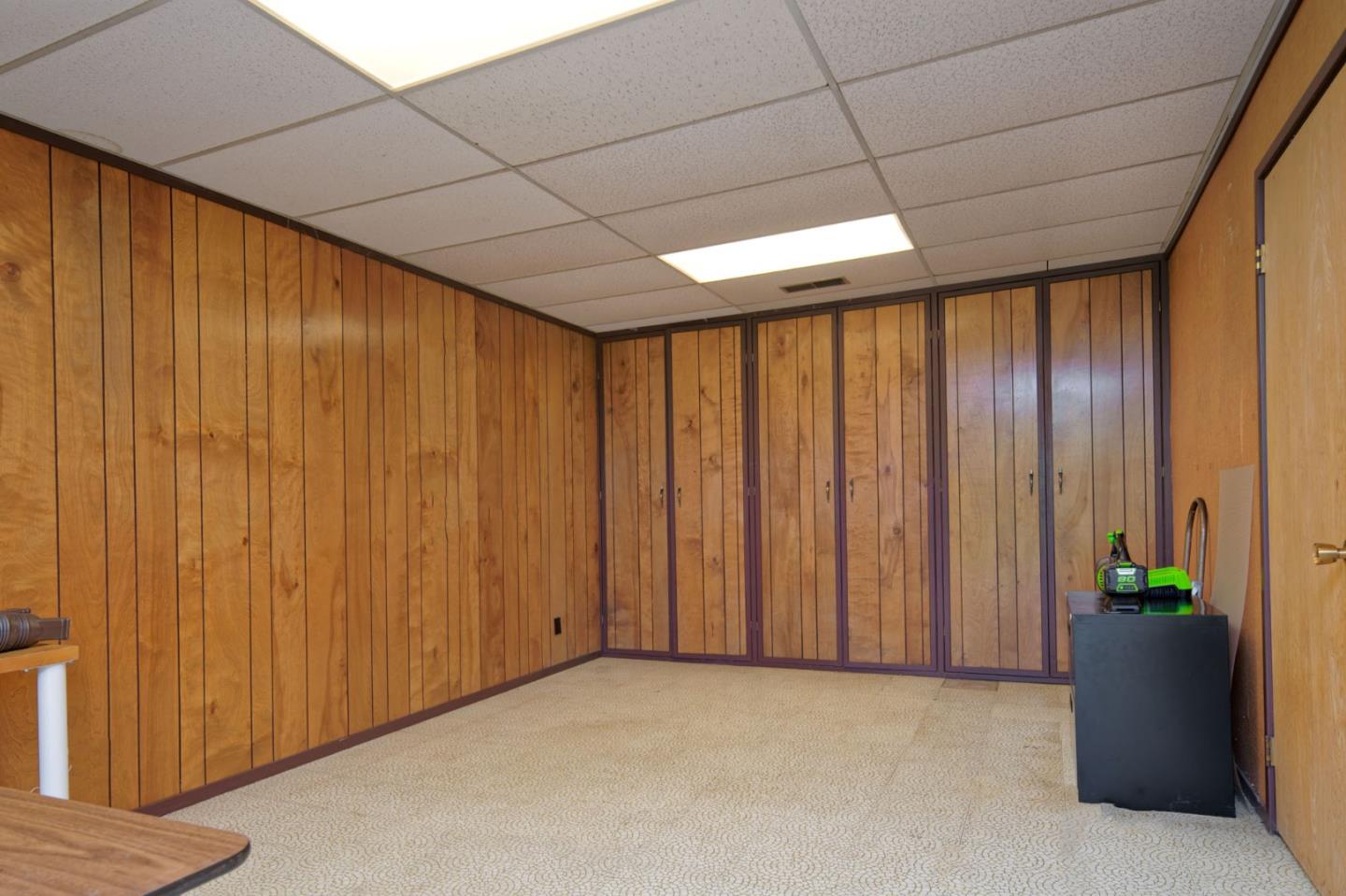 26969 Moody Road Los Altos Hills, CA 94022 - Photo 44 of 52 a big room with wooden floor and windows