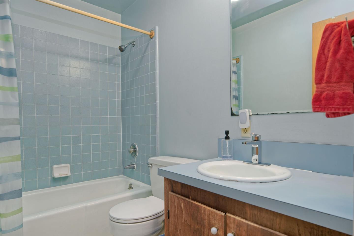 26969 Moody Road Los Altos Hills, CA 94022 - Photo 45 of 52 a bathroom with a sink a toilet and a bathtub