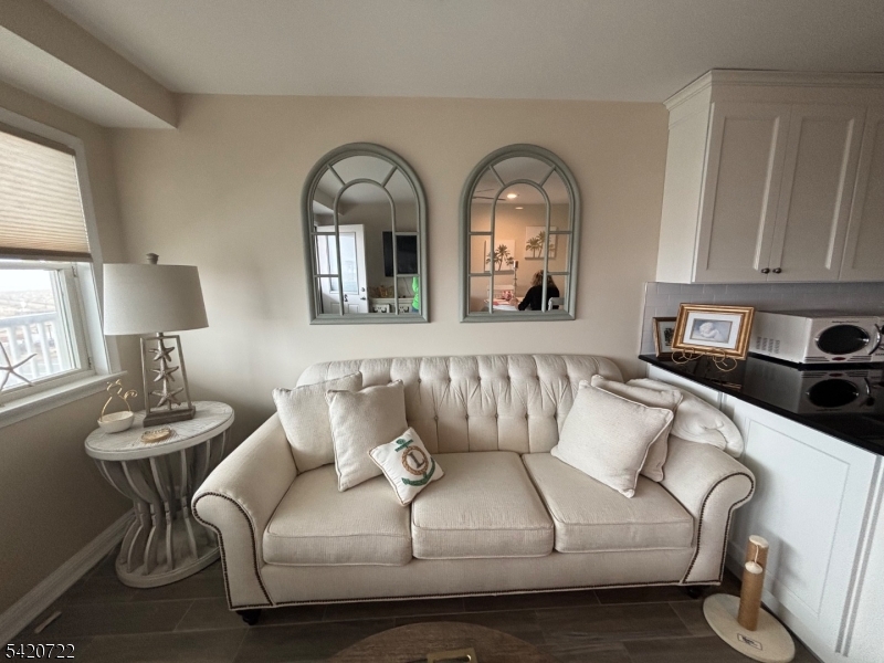 1935 Oceanfront, Unit 20 Seaside Heights, NJ 08751 - Photo 16 of 16 a living room with furniture