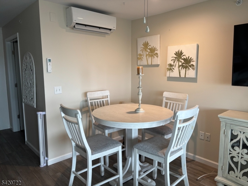 1935 Oceanfront, Unit 20 Seaside Heights, NJ 08751 - Photo 3 of 16 a view of a dining room with furniture