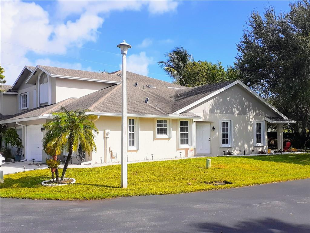 a view of a house with a swimming pool