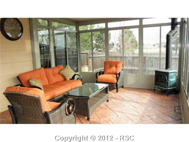 7804 French Road Colorado Springs, CO 80920 - Photo 8 of 14 Heated Sunroom