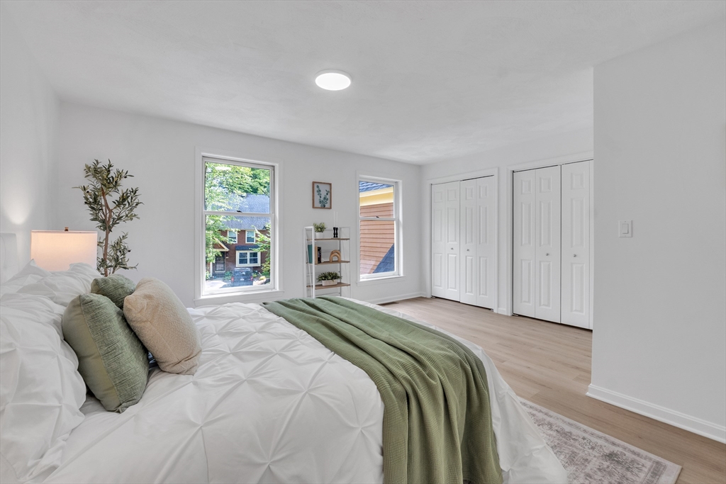 111 Brigham Street, Unit 13B Hudson, MA 01749 - Photo 20 of 23 a bedroom with a bed and a window