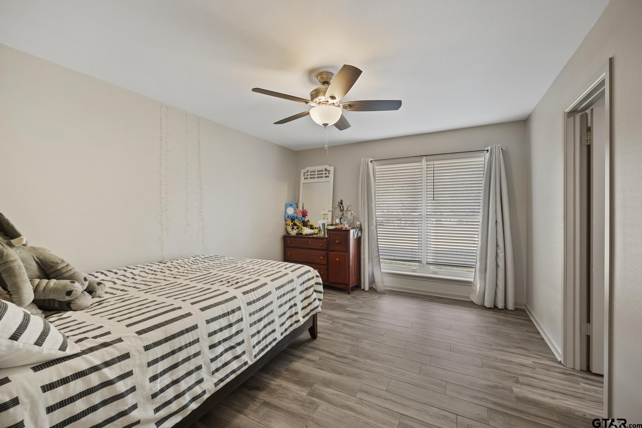 2201 Ridgley Tyler, TX 75703 - Photo 21 of 42 a bedroom with a bed and a closet