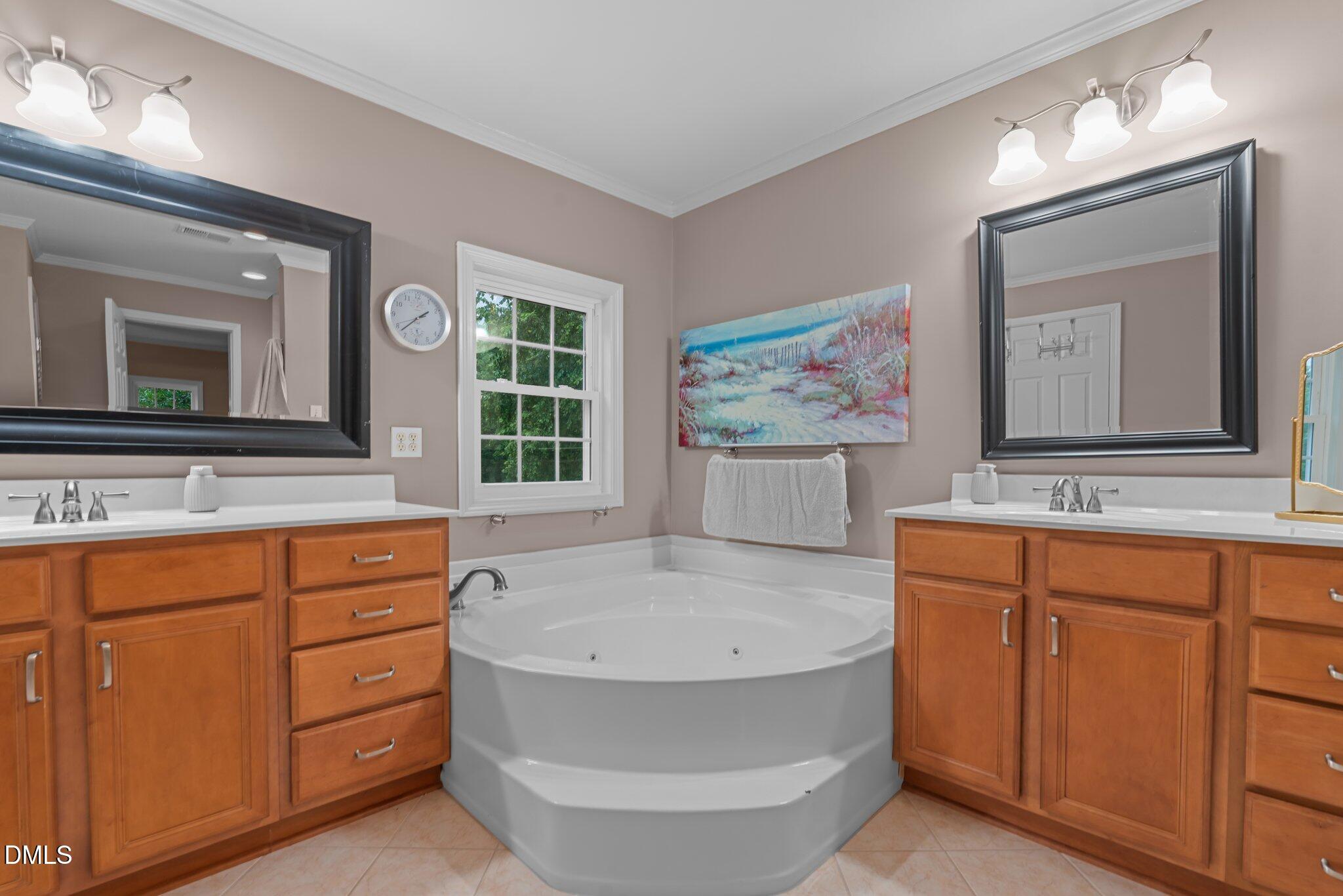431 Patterson Ridge Lane Sanford, NC 27330 - Photo 19 of 29 a bathroom with a tub sink and mirror