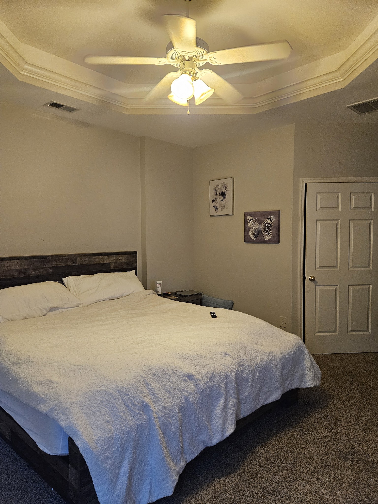 3401 Anderson Road, Unit 34 Antioch, TN 37013 - Photo 6 of 23 a bedroom with a bed and a chandelier