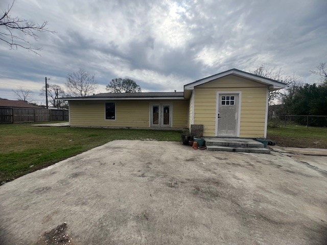 1313 Cos Street Liberty, TX 77575 - Photo 8 of 9 Back of the home, Laundry room on the end