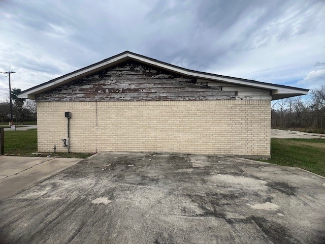 1313 Cos Street Liberty, TX 77575 - Photo 9 of 9 East side view of the home