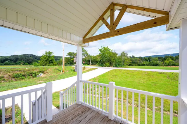 a view of balcony with yard