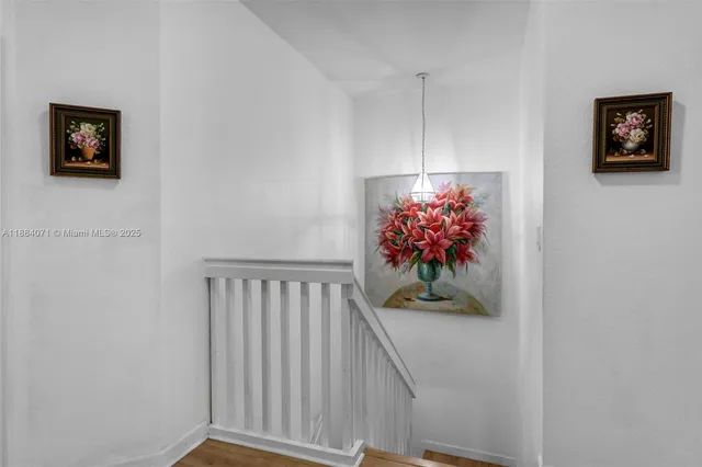 a view of a hallway with workspace