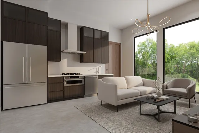 a kitchen with furniture a refrigerator and a stove