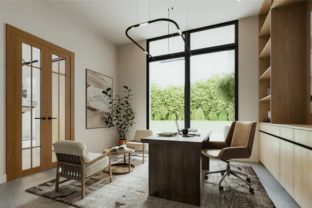 a living room with furniture and large windows